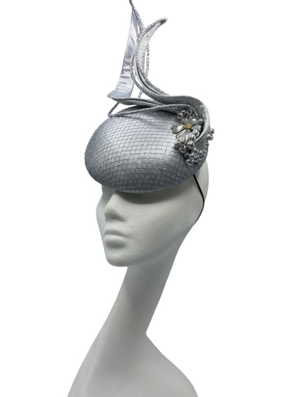 Stunning silver metallic headpiece with beautiful swirl detail to finish.
